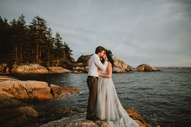 bride and groom kissing at BC waterfront wedding