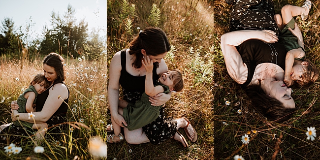 mom and daughter snuggling in flowers during Langley maternity photography session.
