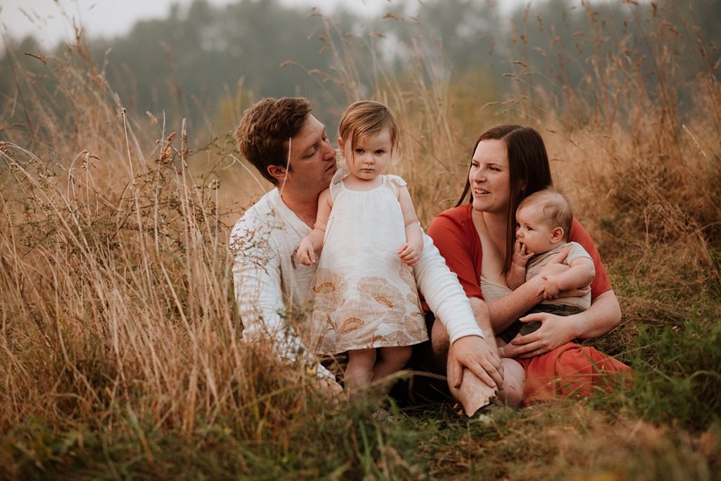 Vancouver family snuggling during their photography session.