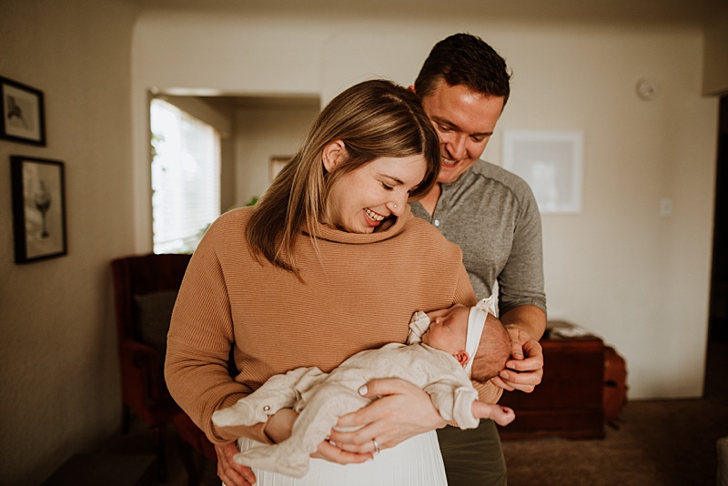 Family welcoming their baby girl during our North Vancouver newborn photography session.