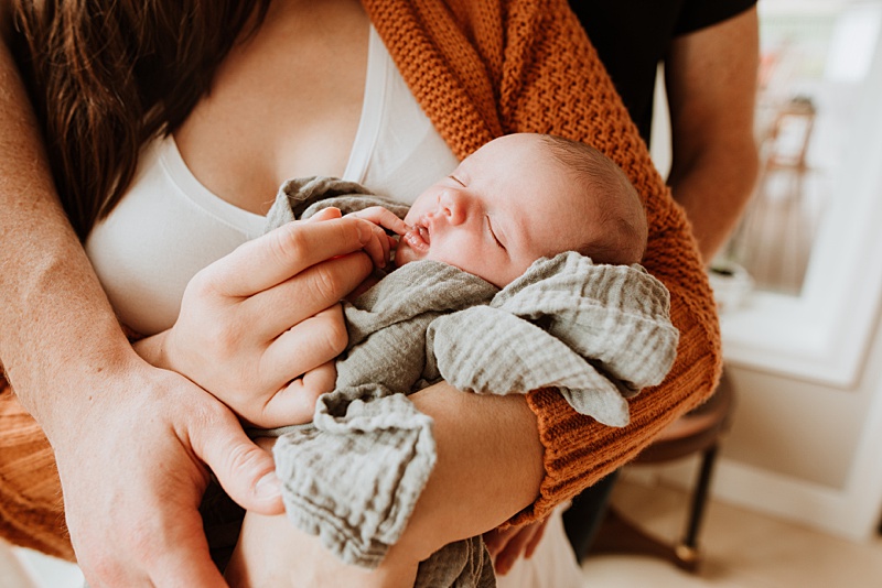 New baby snuggles with mom and dad. Check out this list of Midwives in Victoria BC