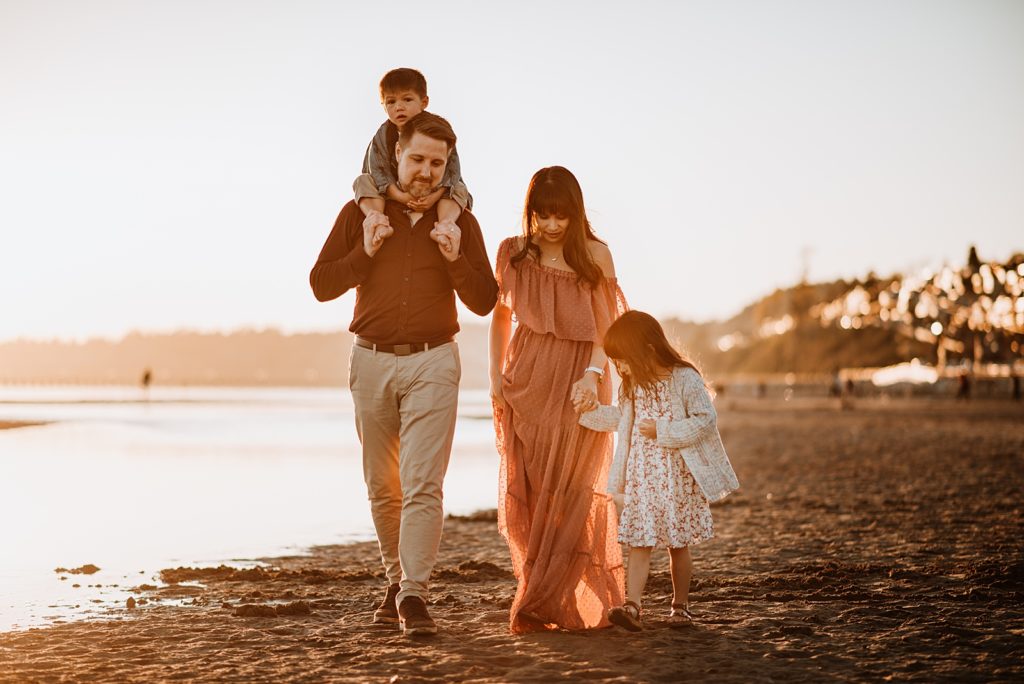 Family walking down the beach - Surrey Family Photographer