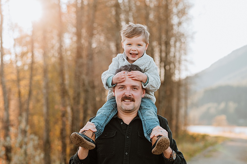 Dad and son playing together. Find Christmas events in Vancouver for the family in this post!
