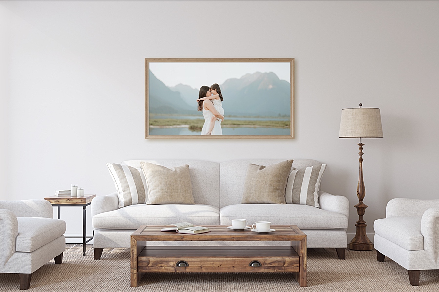 Photo of mother and daughter in a frame on a wall in a living room setting.Why having your family photos on your walls is so important