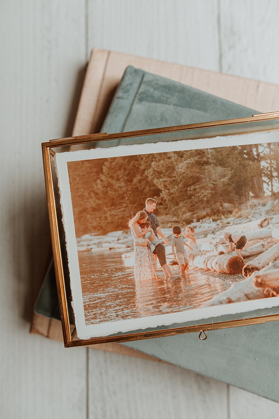 Heirloom albums and print box of family photos
