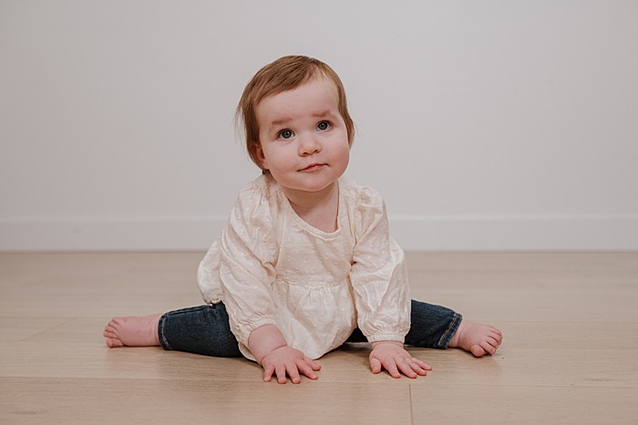 Baby girl during a family session in a Vancouver photography studio 