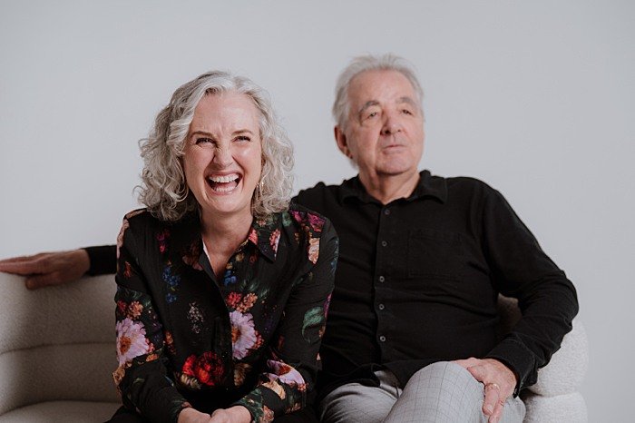 Couple who works together during their business portrait session